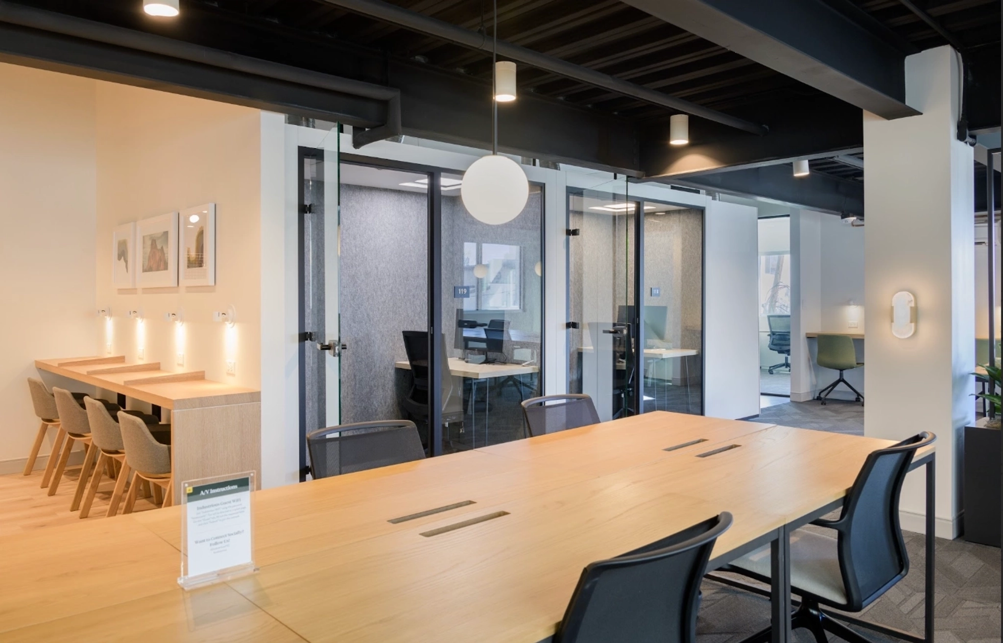 a large, bright meeting room with a large screen