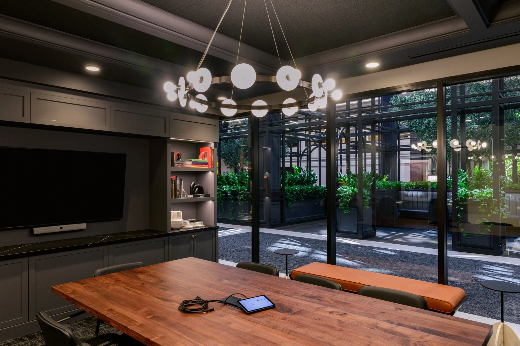 a large, bright meeting room with a large screen