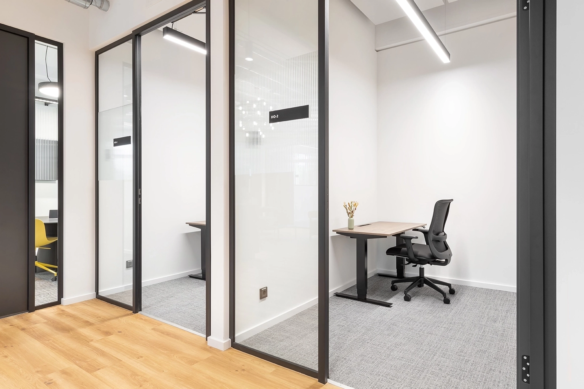 a large, bright meeting room with a large screen