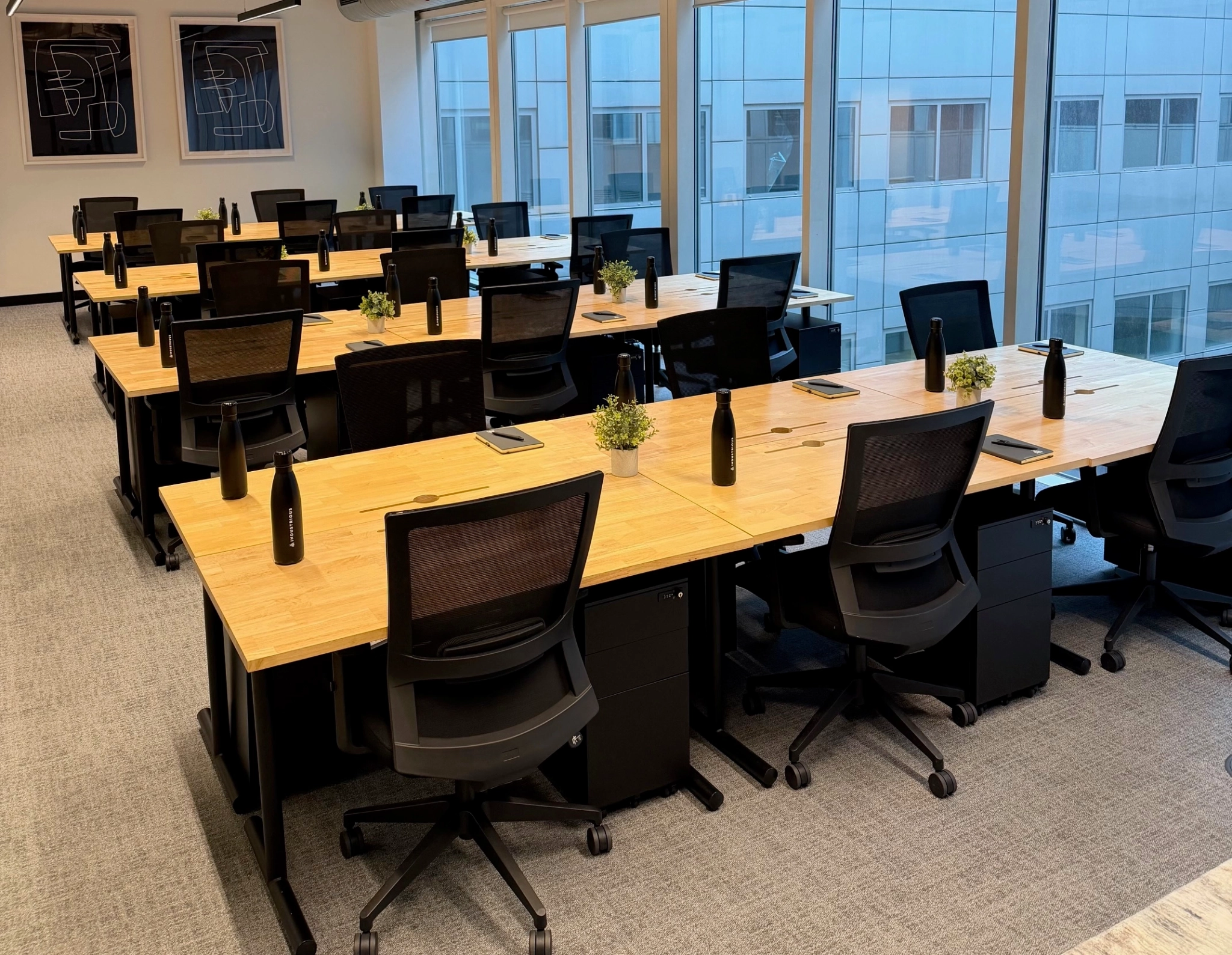 a large, bright meeting room with a large screen
