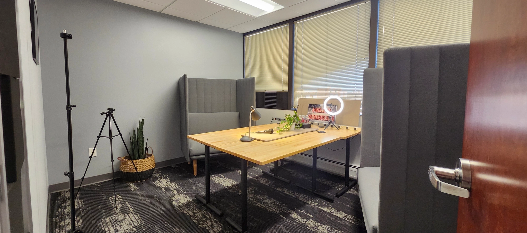 a large, bright meeting room with a large screen